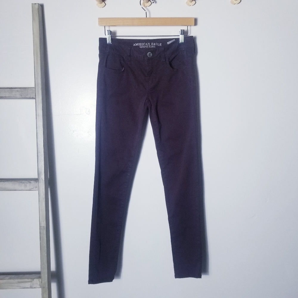 AMERICAN EAGLE OUTFITTERS SUPER STRETCH JEGGING SIZE 4 PURPLE WITH POCKETS